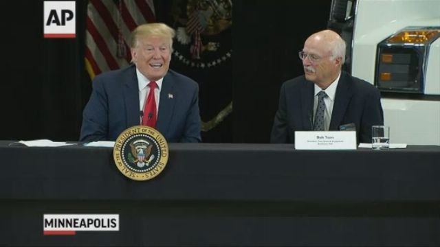Trump seeks mileage for tax cuts at truck company appearance