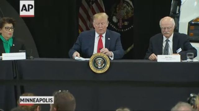 Trump seeks mileage for tax cuts at truck company appearance