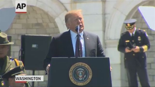 Trump attacks prosecutors at ceremony for fallen officers