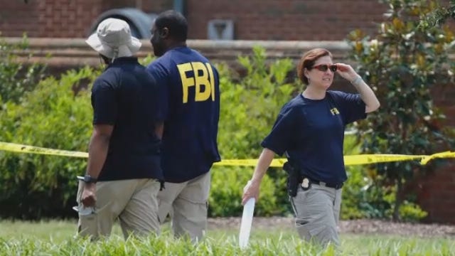 The Latest: Mourners gather to remember shooting victims