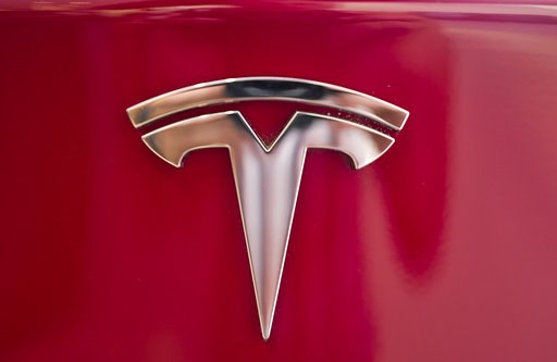 (AP Photo/Richard Vogel). A Tesla emblem is seen on the back end of a Model S in the Tesla showroom in Santa Monica, Calif., on Wednesday, Aug. 8, 2018. Board members at Tesla are evaluating CEO and Chairman Elon Musk's $72 billion proposal to take the... (AP Photo/Richard Vogel). A Tesla emblem is seen on the back end of a Model S in the Tesla showroom in Santa Monica, Calif., on Wednesday, Aug. 8, 2018. Board members at Tesla are evaluating CEO and Chairman Elon Musk's $72 billion proposal to take the...