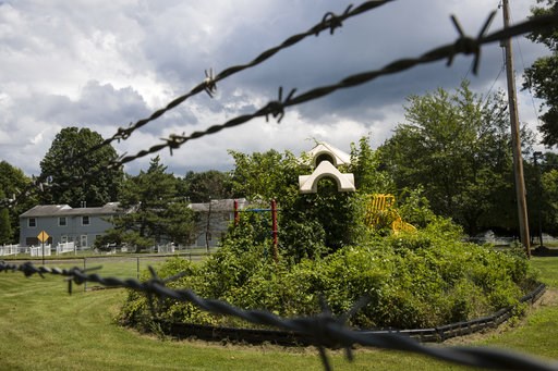 (AP Photo/Matt Rourke). In this Aug. 1, 2018 photo weeds engulf a playground at housing section of the former Naval Air Warfare Center Warminster in Warminster, Pa. In Warminster and surrounding towns in eastern Pennsylvania, and at other sites around ... (AP Photo/Matt Rourke). In this Aug. 1, 2018 photo weeds engulf a playground at housing section of the former Naval Air Warfare Center Warminster in Warminster, Pa. In Warminster and surrounding towns in eastern Pennsylvania, and at other sites around ...