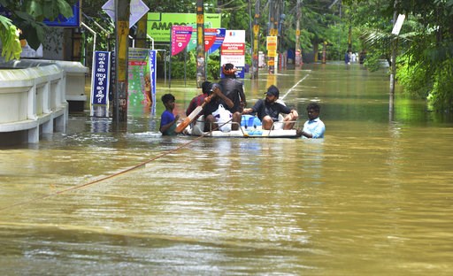 People plucked from rooftops as Indian floods kill 324