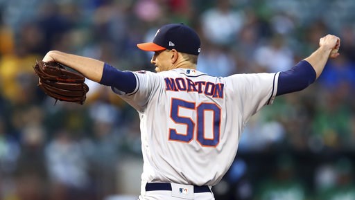 Matt Olson homers in 10th, A's pull within game of Astros