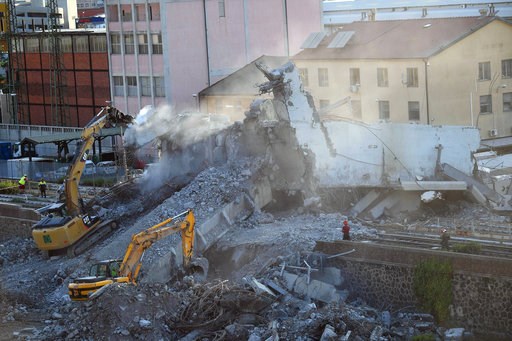 Italy's leader demands safe roads; bridge toll rises to 43