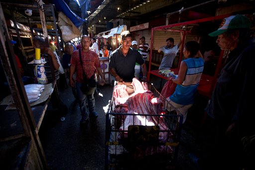 Venezuelans nervously await dramatic economic reforms