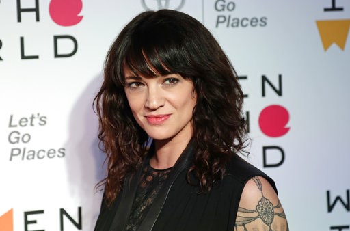 Argento denies sexual assault, says Bourdain made payment