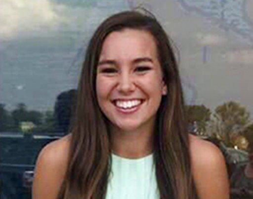 The Latest: Suspect worked at farm tied to Republican farmer