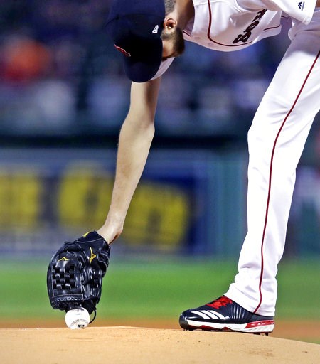 (AP Photo/Charles Krupa). Boston Red Sox starting pitcher Chris Sale reaches down to the mound to pick up the baseball as he prepares for the the first inning of a baseball game against the Toronto Blue Jays at Fenway Park in Boston, Tuesday, Sept. 11,... (AP Photo/Charles Krupa). Boston Red Sox starting pitcher Chris Sale reaches down to the mound to pick up the baseball as he prepares for the the first inning of a baseball game against the Toronto Blue Jays at Fenway Park in Boston, Tuesday, Sept. 11,...