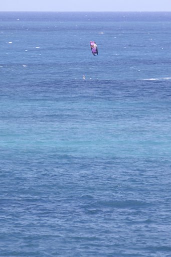 (AP Photo/Caleb Jones). A kite surfer rides a wave as Tropical Storm Olivia approaches Hawaii, Tuesday, Sept. 11, 2018, near Honolulu. The National Weather Service says the storm could dump as much as 20 inches of rain on some parts of the islands as i... (AP Photo/Caleb Jones). A kite surfer rides a wave as Tropical Storm Olivia approaches Hawaii, Tuesday, Sept. 11, 2018, near Honolulu. The National Weather Service says the storm could dump as much as 20 inches of rain on some parts of the islands as i...
