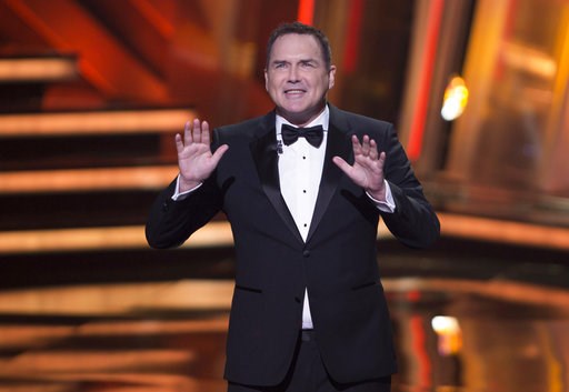 (Peter Power/The Canadian Press via AP, File). FILE - In this March 13, 2016, file photo, Norm Macdonald begins as host of the Canadian Screen Awards in Toronto. “The Tonight Show canceled an appearance by Macdonald after he made comments about the MeT...