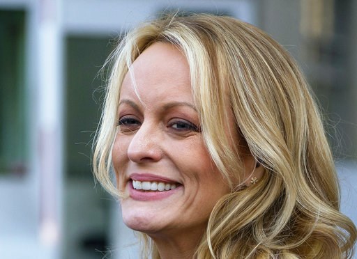(AP Photo/Craig Ruttle). FILE - In this April 16, 2018 file photo, adult film actress Stormy Daniels speaks to members of the media after a hearing at federal court in New York. Daniels is telling her story in a new memoir titled “Full Disclosure.” T...