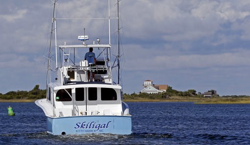 (AP Photo/Gerry Broome). A charter boat captain navigates the Oregon Inlet near Nags Head, N.C., Wednesday, Sept. 12, 2018 as Hurricane Florence approaches the coast of the Carolinas. The National Weather Service says Florence "will likely be the storm... (AP Photo/Gerry Broome). A charter boat captain navigates the Oregon Inlet near Nags Head, N.C., Wednesday, Sept. 12, 2018 as Hurricane Florence approaches the coast of the Carolinas. The National Weather Service says Florence "will likely be the storm...