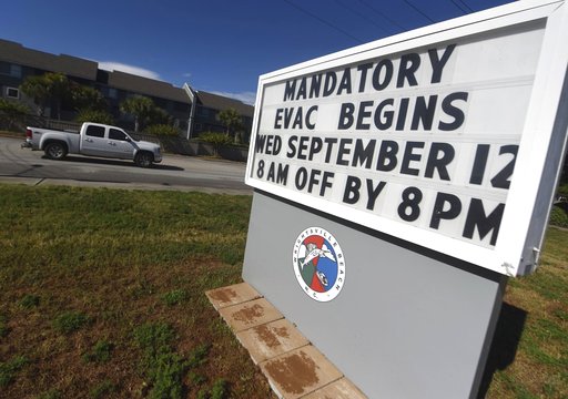 (Matt Born/The Star-News via AP). A sign warns residents about the mandatory evacuation in front of Wrightsville Beach Park in Wrightsville Beach, N.C., Wednesday, Sept. 12, 2018. The effects of Hurricane Florence in Southeastern North Carolina are exp... (Matt Born/The Star-News via AP). A sign warns residents about the mandatory evacuation in front of Wrightsville Beach Park in Wrightsville Beach, N.C., Wednesday, Sept. 12, 2018. The effects of Hurricane Florence in Southeastern North Carolina are exp...