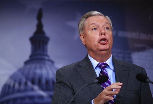 (AP Photo/Manuel Balce Ceneta). FILE - In this Nov. 1, 2017 file photo, Sen. Lindsey Graham, R-S.C., speaks on Capitol Hill in Washington. Graham’s shift from Never Trump to Team Trump has confused colleagues and caused double-takes across Washington. (AP Photo/Manuel Balce Ceneta). FILE - In this Nov. 1, 2017 file photo, Sen. Lindsey Graham, R-S.C., speaks on Capitol Hill in Washington. Graham’s shift from Never Trump to Team Trump has confused colleagues and caused double-takes across Washington.