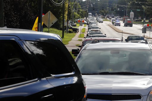 (Jonathon Gruenke/The Daily Press via AP). Traffic backs up along Oyster Point Road as people attempt to pickup sandbags Wednesday morning, Sept. 12, 2018. The city of Newport News was offering free sandbags to residents at the Public Works Operations ... (Jonathon Gruenke/The Daily Press via AP). Traffic backs up along Oyster Point Road as people attempt to pickup sandbags Wednesday morning, Sept. 12, 2018. The city of Newport News was offering free sandbags to residents at the Public Works Operations ...