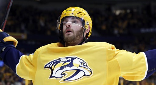 (AP Photo/Mark Humphrey). FILE - In this March 8, 2018 file photo Nashville Predators left wing Austin Watson celebrates after scoring a goal against the Anaheim Ducks in the second period of an NHL hockey game in Nashville, Tenn. Watson has been suspe... (AP Photo/Mark Humphrey). FILE - In this March 8, 2018 file photo Nashville Predators left wing Austin Watson celebrates after scoring a goal against the Anaheim Ducks in the second period of an NHL hockey game in Nashville, Tenn. Watson has been suspe...