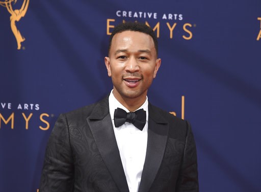 (Photo by Richard Shotwell/Invision/AP, File). FILE - In this Sept. 9, 2018 file photo, John Legend arrives at the Creative Arts Emmy Awards in Los Angeles. Legend will become a coach on NBC’s “The Voice.” (Photo by Richard Shotwell/Invision/AP, File). FILE - In this Sept. 9, 2018 file photo, John Legend arrives at the Creative Arts Emmy Awards in Los Angeles. Legend will become a coach on NBC’s “The Voice.”