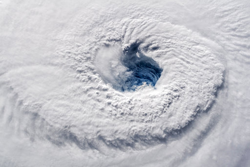 (Alexander Gerst/ESA/NASA via AP). In this Sept. 12, 2018 photo provided by NASA, Hurricane Florence churns over the Atlantic Ocean heading for the U.S. east coast as seen from the International Space Station. Astronaut Alexander Gerst, who shot the ph... (Alexander Gerst/ESA/NASA via AP). In this Sept. 12, 2018 photo provided by NASA, Hurricane Florence churns over the Atlantic Ocean heading for the U.S. east coast as seen from the International Space Station. Astronaut Alexander Gerst, who shot the ph...