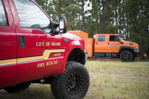 (AP Photo/Sean Rayford). A utility truck passes a vehicle from a special operations rescue team from Miami, outside the South Carolina National Guard Readiness Center as Hurricane Florence prepares for landfall on the East Coast Thursday, Sept. 13, 20... (AP Photo/Sean Rayford). A utility truck passes a vehicle from a special operations rescue team from Miami, outside the South Carolina National Guard Readiness Center as Hurricane Florence prepares for landfall on the East Coast Thursday, Sept. 13, 20...