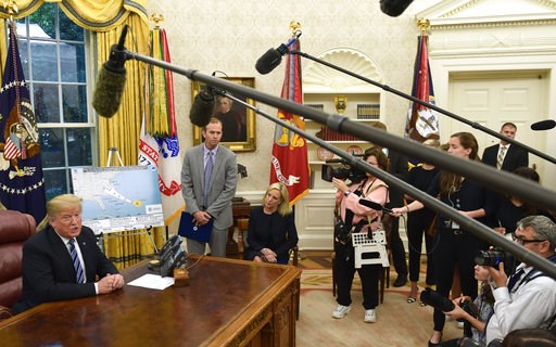 (AP Photo/Susan Walsh). President Donald Trump, left, joined by FEMA Administrator Brock Long, second from left, and Homeland Security Secretary Kirstjen Nielsen, center, speaks during a briefing on Hurricane Florence in the Oval Office of the White Ho... (AP Photo/Susan Walsh). President Donald Trump, left, joined by FEMA Administrator Brock Long, second from left, and Homeland Security Secretary Kirstjen Nielsen, center, speaks during a briefing on Hurricane Florence in the Oval Office of the White Ho...