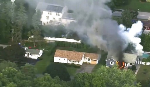 (WCVB via AP). In this image take from video provided by WCVB in Boston, flames rise from a house in Lawrence, Mass, a suburb of Boston, Thursday, Sept. 13, 2018. Emergency crews are responding to what they believe is a series of gas explosions that ha... (WCVB via AP). In this image take from video provided by WCVB in Boston, flames rise from a house in Lawrence, Mass, a suburb of Boston, Thursday, Sept. 13, 2018. Emergency crews are responding to what they believe is a series of gas explosions that ha...