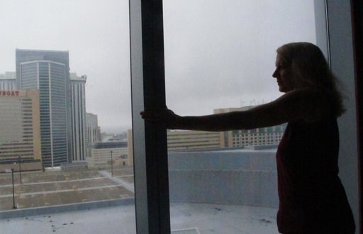 (AP Photo/Wayne Parry). Mimi Razzi of Pawleys Island, S.C. looks out the window from her room at the Ocean Resort Casino in Atlantic City N.J. on Friday Sept. 14, 2018. Razzi was one of hundreds of people fleeing Hurricane Florence who accepted the cas... (AP Photo/Wayne Parry). Mimi Razzi of Pawleys Island, S.C. looks out the window from her room at the Ocean Resort Casino in Atlantic City N.J. on Friday Sept. 14, 2018. Razzi was one of hundreds of people fleeing Hurricane Florence who accepted the cas...