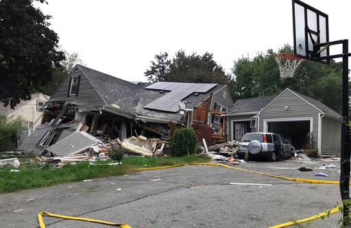 (Carl Russo/The Eagle-Tribune via AP). ADDS IDENITY OF VICTIM LEONEL RONDON- A collapsed home and car sit damaged on Chickering Street in Lawrence, Mass., Thursday, Sept. 13, 2018, after a series of gas explosions in several communities north of Bosto... (Carl Russo/The Eagle-Tribune via AP). ADDS IDENITY OF VICTIM LEONEL RONDON- A collapsed home and car sit damaged on Chickering Street in Lawrence, Mass., Thursday, Sept. 13, 2018, after a series of gas explosions in several communities north of Bosto...