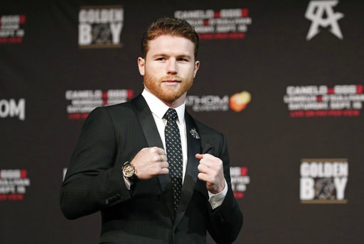 (AP Photo/John Locher). Canelo Alvarez poses during a news conference Wednesday, Sept. 12, 2018, in Las Vegas. Alvarez is scheduled to fight Gennady Golovkin in a title bout Saturday in Las Vegas. (AP Photo/John Locher). Canelo Alvarez poses during a news conference Wednesday, Sept. 12, 2018, in Las Vegas. Alvarez is scheduled to fight Gennady Golovkin in a title bout Saturday in Las Vegas.