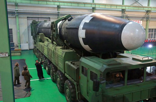 (Korean Central News Agency/Korea News Service via AP, File). FILE - In this Nov. 29, 2017, file photo provided by the North Korean government shows North Korean leader Kim Jong Un, third from left, and what the North Korean government calls the Hwason... (Korean Central News Agency/Korea News Service via AP, File). FILE - In this Nov. 29, 2017, file photo provided by the North Korean government shows North Korean leader Kim Jong Un, third from left, and what the North Korean government calls the Hwason...