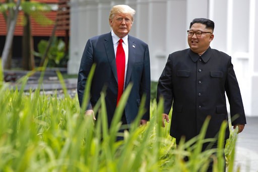 (AP Photo/Evan Vucci, File). FILE - In this June 12, 2018 file photo, President Donald Trump walks with North Korean leader Kim Jong Un on Sentosa Island, in Singapore. South Korea’s liberal President Moon Jae-in faces growing skepticism at home about ... (AP Photo/Evan Vucci, File). FILE - In this June 12, 2018 file photo, President Donald Trump walks with North Korean leader Kim Jong Un on Sentosa Island, in Singapore. South Korea’s liberal President Moon Jae-in faces growing skepticism at home about ...