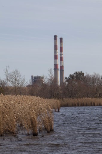 (AP Photo/Randall Hill, File). FILE - This Feb. 19, 2014 file photo shows the L.V. Sutton Complex operated by Duke Energy from the Sutton Lake landing in Wilmington, N.C. Duke Energy says heavy rains from Florence have caused a slope to collapse at a c... (AP Photo/Randall Hill, File). FILE - This Feb. 19, 2014 file photo shows the L.V. Sutton Complex operated by Duke Energy from the Sutton Lake landing in Wilmington, N.C. Duke Energy says heavy rains from Florence have caused a slope to collapse at a c...