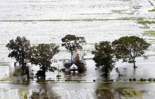 (AP Photo/Steve Helber). A farm house is surrounded by flooded fields from tropical storm Florence in Hyde County, N.C., Saturday, Sept. 15, 2018. (AP Photo/Steve Helber). A farm house is surrounded by flooded fields from tropical storm Florence in Hyde County, N.C., Saturday, Sept. 15, 2018.