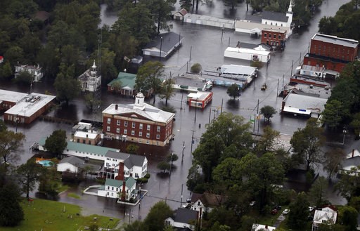 Emergency crews throw supply lifeline to isolated Wilmington