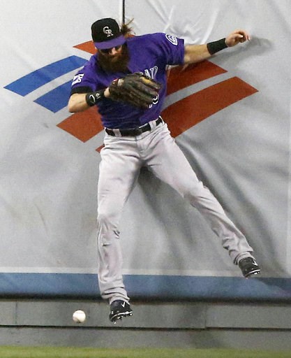 LEADING OFF: Rockies-Dodgers duel, Red Sox try to clinch