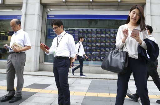 Global shares rise as traders shrug off new China-US tariffs