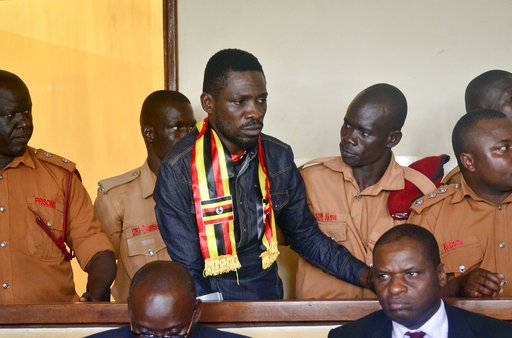 Ugandan pop star vows to fight on after arriving from US