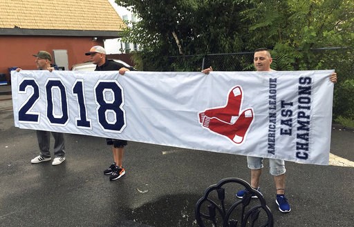 Too soon? Fans find Red Sox division title banner in street