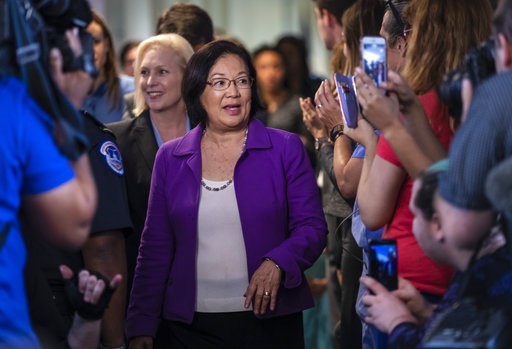Telling men to 'step up,' Sen. Hirono strides into spotlight