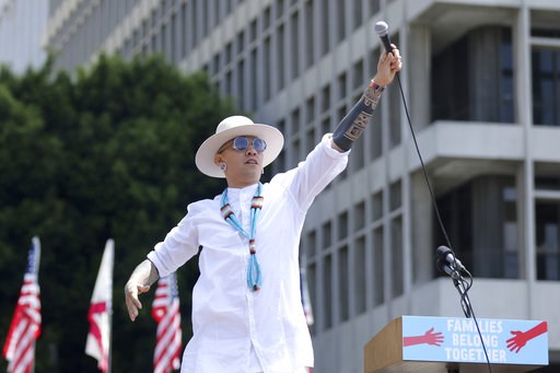 Black Eyed Peas tackle gun violence, immigration in videos