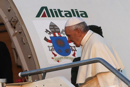 The Latest: Pope quips "I am the devil" next to John Paul