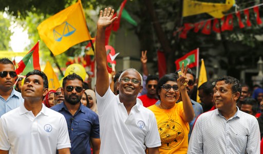 The Latest: Official: Campaign office raided in bribery case