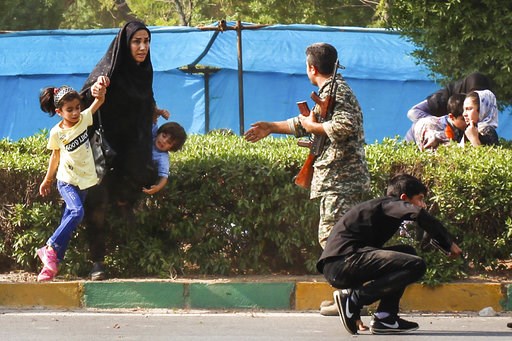Iran's president blames US after attack on military parade