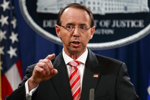 Amid furor, Trump pushes pause on deciding Rosenstein's fate