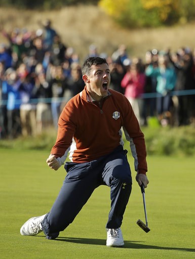(AP Photo/Matt Dunham). Europe's Rory McIlroy celebrates after holing a putt to halve the 5th during a fourball match on the second day of the 42nd Ryder Cup at Le Golf National in Saint-Quentin-en-Yvelines, outside Paris, France, Saturday, Sept. 29, 2... (AP Photo/Matt Dunham). Europe's Rory McIlroy celebrates after holing a putt to halve the 5th during a fourball match on the second day of the 42nd Ryder Cup at Le Golf National in Saint-Quentin-en-Yvelines, outside Paris, France, Saturday, Sept. 29, 2...