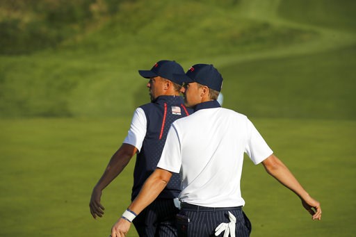 (AP Photo/Francois Mori). Jordan Spieth, right, and his teammate Justin Thomas walk off the 12th tee during their foursome match on the second day of the 2018 Ryder Cup at Le Golf National in Saint Quentin-en-Yvelines, outside Paris, France, Saturday, ... (AP Photo/Francois Mori). Jordan Spieth, right, and his teammate Justin Thomas walk off the 12th tee during their foursome match on the second day of the 2018 Ryder Cup at Le Golf National in Saint Quentin-en-Yvelines, outside Paris, France, Saturday, ...
