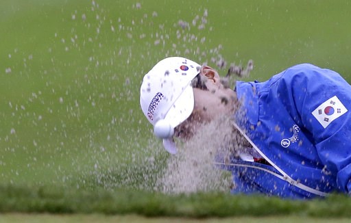 (AP Photo/Ahn Young-joon). Sung Hyun Park of South Korea hits out of a bunker on the first hole during the second round of the LPGA's UL International Crown golf tournament at the Jack Nicklaus Golf Club Korea in Incheon, South Korea, Friday, Oct. 5, 2... (AP Photo/Ahn Young-joon). Sung Hyun Park of South Korea hits out of a bunker on the first hole during the second round of the LPGA's UL International Crown golf tournament at the Jack Nicklaus Golf Club Korea in Incheon, South Korea, Friday, Oct. 5, 2...