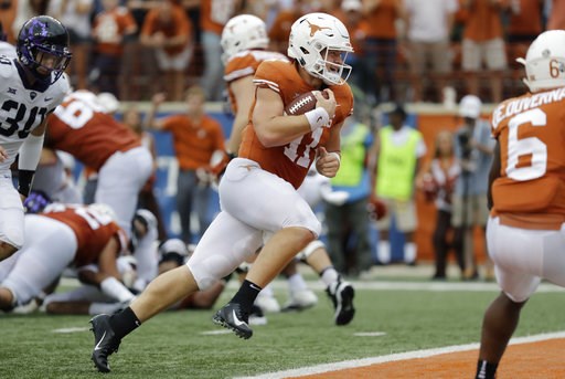 (AP Photo/Eric Gay, File). FILE - In this Sept. 22, 2018, file photo, Texas quarterback Sam Ehlinger (11) runs for a 2-yard touchdown against TCU during the second half of an NCAA college football game in Austin, Texas. Ehlinger has thrown for at least... (AP Photo/Eric Gay, File). FILE - In this Sept. 22, 2018, file photo, Texas quarterback Sam Ehlinger (11) runs for a 2-yard touchdown against TCU during the second half of an NCAA college football game in Austin, Texas. Ehlinger has thrown for at least...