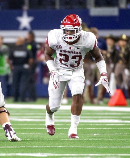 (AP Photo/Jeffrey McWhorter). Arkansas' Dre Greenlaw (23) during the second half of an NCAA college football game, Saturday, Sept. 29, 2018, in Arlington, Texas. (AP Photo/Jeffrey McWhorter). Arkansas' Dre Greenlaw (23) during the second half of an NCAA college football game, Saturday, Sept. 29, 2018, in Arlington, Texas.