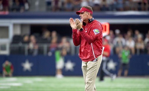 (AP Photo/Jeffrey McWhorter). Arkansas head coach Chad Morris during the first half of an NCAA college football game, Saturday, Sept. 29, 2018, in Arlington, Texas. (AP Photo/Jeffrey McWhorter). Arkansas head coach Chad Morris during the first half of an NCAA college football game, Saturday, Sept. 29, 2018, in Arlington, Texas.